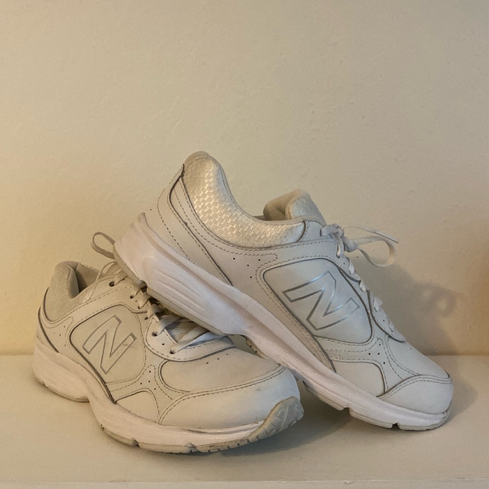 New Balance white grandpa style sneakers.